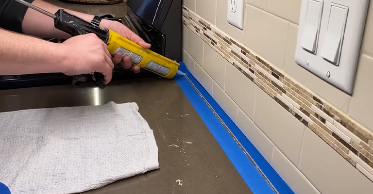 Fill The Caulking Gun With Caulk