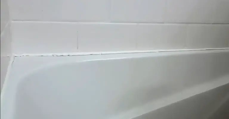 Is It OK To Caulk Over Grout