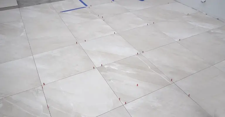 Can I Lay Tile Over Painted Concrete Floor