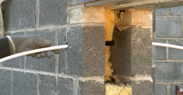 Why Does a Gas Pipe Need to Be Sleeved Through a Wall?