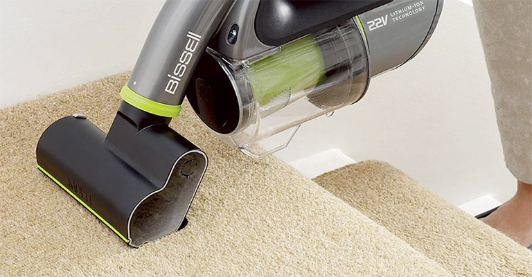 using vacuum cleaner to protect carpeted stairs from dirt