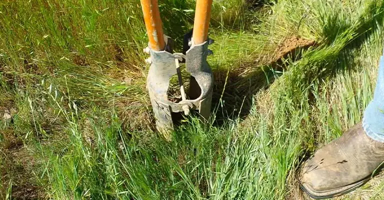 Using A Post Hole Digger Tool
