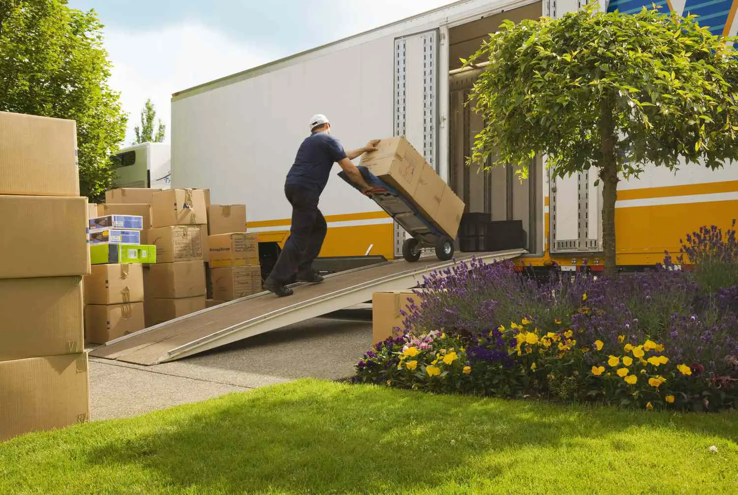 loading boxes moving Tips for Preparing for a Long-Distance Relocation